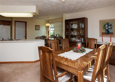 Open to the living room and eat in kitchen is the 