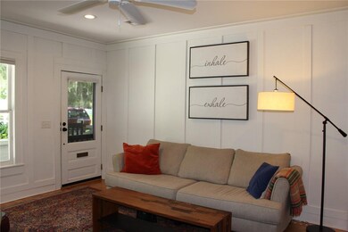Front door enters comfortable living area.