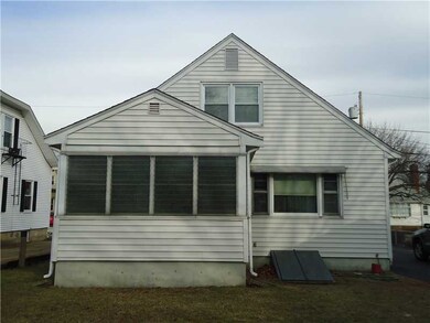 Exterior Back. FLORIDA ROOM IS TO LEFT, BULK HEAD