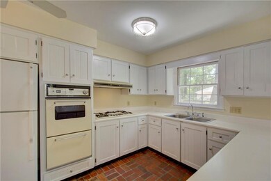 Traditional kitchen with plenty of cabinets and co