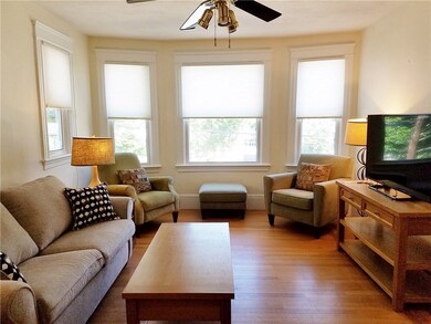Living room is filled with sunlight.
