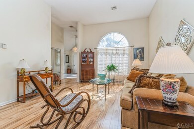 View of Entry and Decorative Window from Living Room