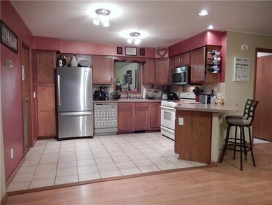 kitchen has ceramic floor