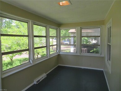 Enclosed front porch