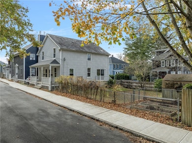 Original slate roof. Newer asphalt roof shingles on the overhangs.