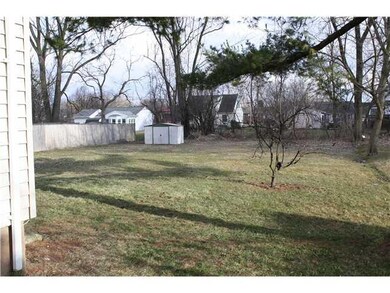 Exterior Back Large back yard with storage shed