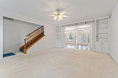 Living room, stairs up to  bonus room