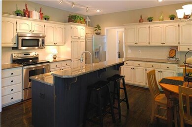 Spacious kitchen with island. Granite, stainless s