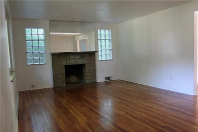 A view of the living room as entering the front do