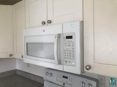 Room details featuring white cabinets