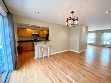 Dinning area with slider door to balcony