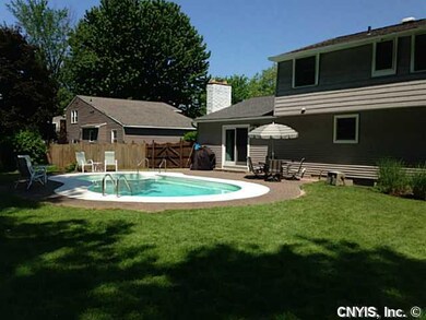 Backyard Perfectly maintained kidney shaped, heated pool and patio
