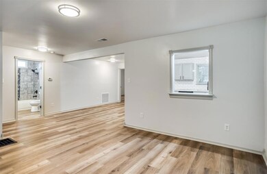 Living opens to Kitchen and Breakfast