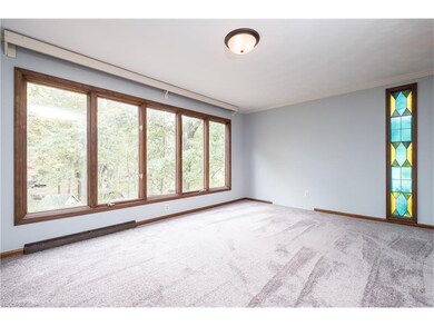 This beautiful family room looks out over the back