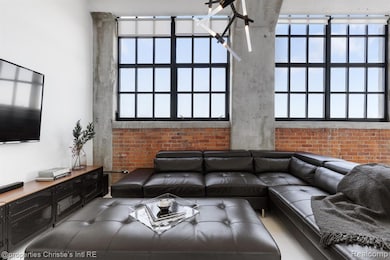 Living room featuring healthy amount of natural light