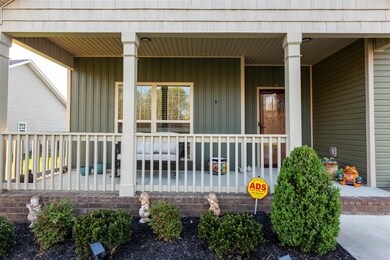 The front porch really makes this home stand out. 