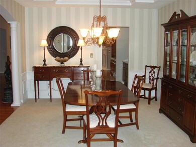 Formal Dining Room with Access to Butler Area and 