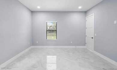 Empty room with recessed lighting