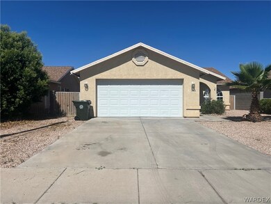Ranch-style house with a garage