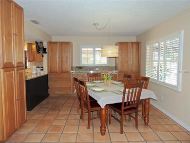 Kitchen eat-in area with generous use of storage c