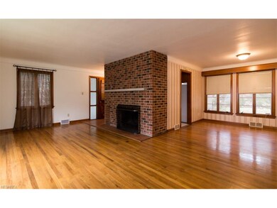 You will love the gleaming hardwood floors that fl