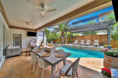 Step into your backyard oasis offering covered bac