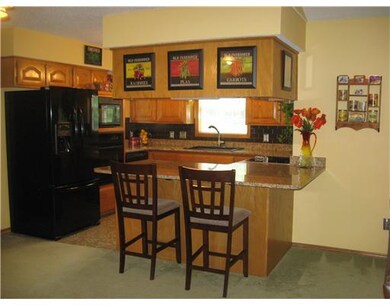 Kitchen. Window above sink overlooks backyard.
