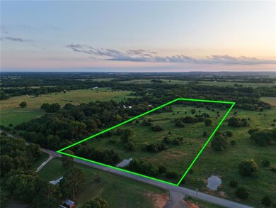 Aerial view at dusk of a view of rural / pastoral area and property boundaries highlighted