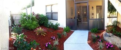 Entryway, showing lush foliage.