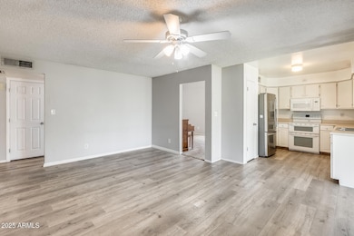 Open family room, dining and kitchen