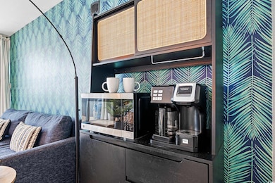 Bar area with wallpapered walls