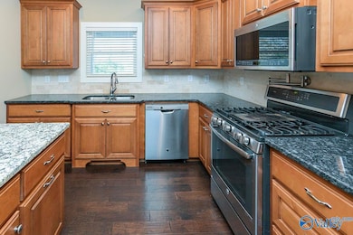 Gas Range and pot-filler! Beautiful view to pool area