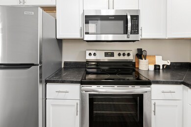 Everything in this kitchen is NEW!  You can be the first to use those gleaming stainless steel appliances.