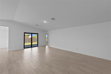 23414 Macdougall Ave, Port Charlotte, FL 33953 - photo 3