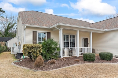 Entrance to property with covered porch, a shingle