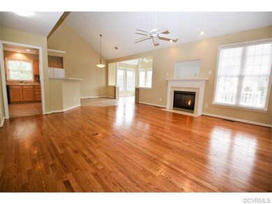 The hardwoods in the family room are newly refinis