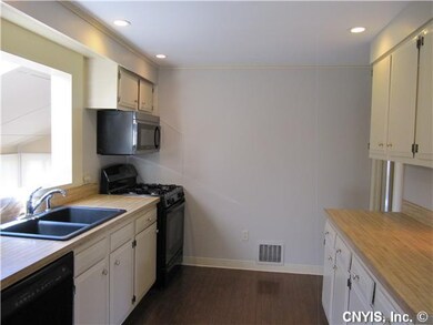 Kitchen. Kitchen overlooks 4-seasons room.