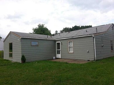 Exterior Back. Area for relaxing and grilling!