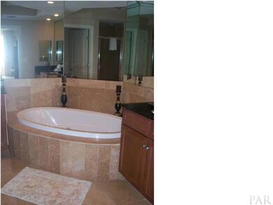 The master bedroom has access to the balcony.