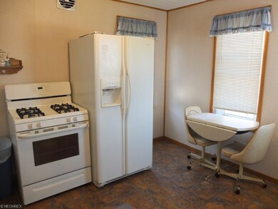 Applianced, eat in kitchen is open to the dining r