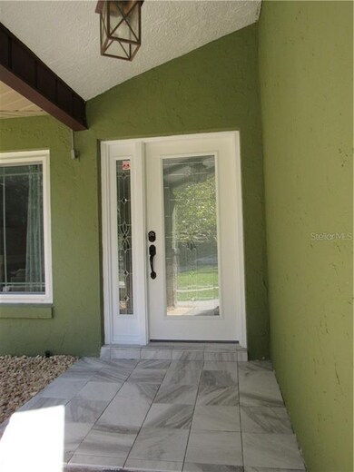 Newly tiled entry way shows off the entrance!