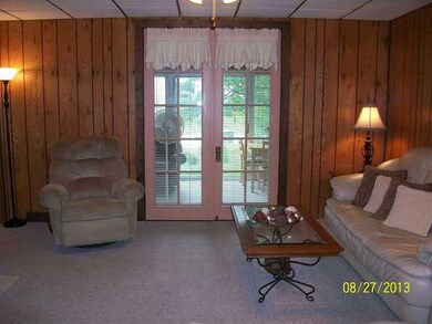 Living Room. Follow the French doors into the heat