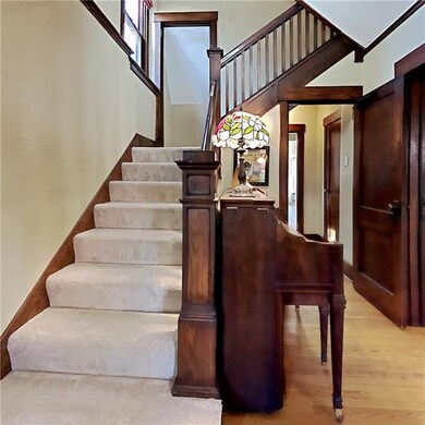 Entry with pocket doors to living room