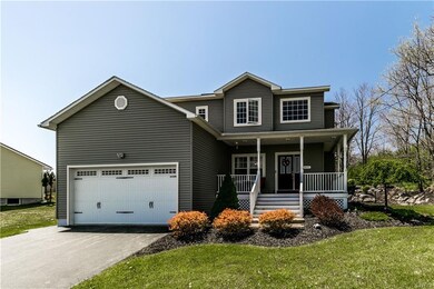 Pristine, lovely home features a wide driveway, a 