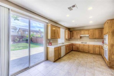 Kitchen Looking Out to the Large Backyard.