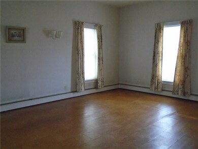 Second living room in the front of the home.  Floo