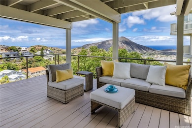 Lovely large covered deck on the lower level is pe