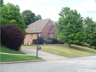 This house is across the street and to the right.