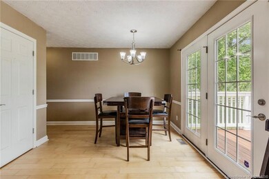 Dining Area w/ French Doors to Back Deck