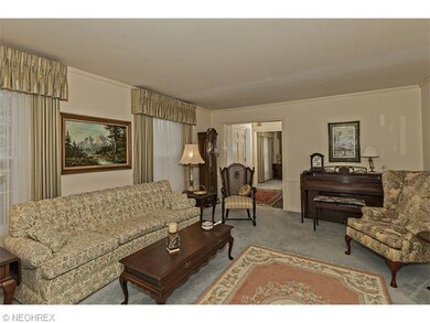 On the other side of the foyer is the living room